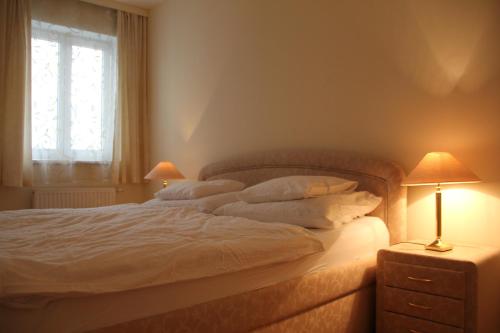 Säng eller sängar i ett rum på Premarental Apartment
