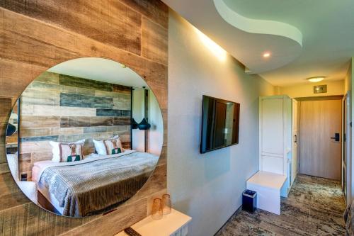 Postel nebo postele na pokoji v ubytování Grand Hotel Murgavets