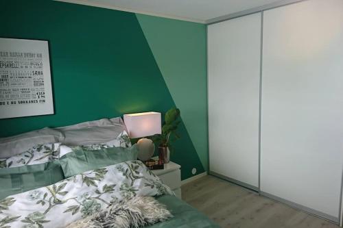 Postel nebo postele na pokoji v ubytování Apartment with 3 bedrooms and nice view close to city centre