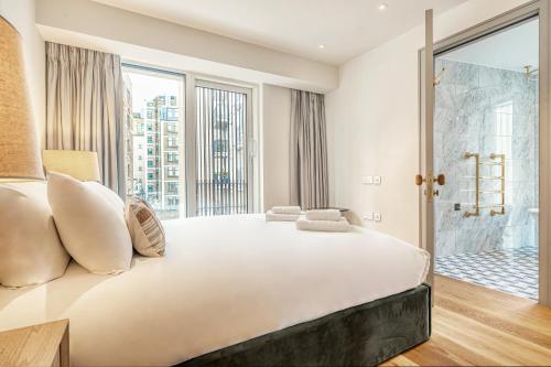 Letto o letti in una camera di Luxury flats near Big Ben and London Eye