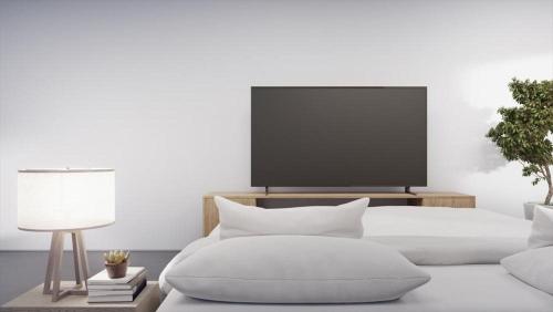 Postel nebo postele na pokoji v ubytování Milan Suite in Abu Dhabi