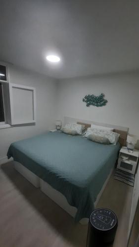 En eller flere senge i et værelse på APARTAMENTO BUNGAMERICA n112