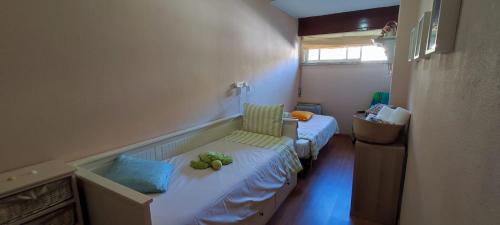 Postel nebo postele na pokoji v ubytování Casa Das Conchas