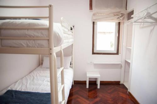 Katil atau katil-katil dalam bilik di Casa amplia, confortable, céntrica by Prishomes