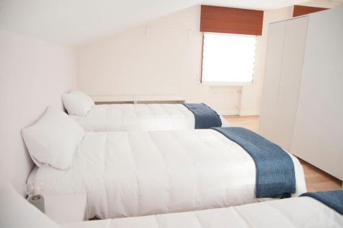 Katil atau katil-katil dalam bilik di Casa amplia, confortable, céntrica by Prishomes