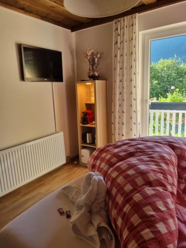 Postel nebo postele na pokoji v ubytování Boutique Hotel Alpenhof