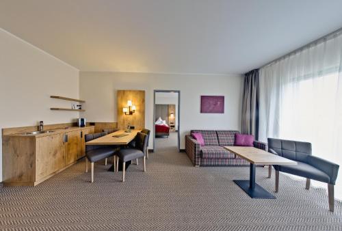 Posezení v ubytování Santé Royale Hotel- & Gesundheitsresort Warmbad Wolkenstein