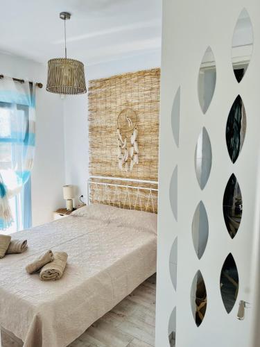 Ένα ή περισσότερα κρεβάτια σε δωμάτιο στο My Naxian Home 1