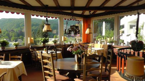 מסעדה או מקום אחר לאכול בו ב-Hotel Kurhaus Uhlenberg
