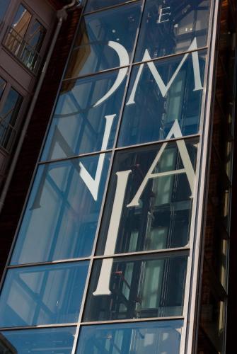a sign on the side of a glass building at The Omnia in Zermatt
