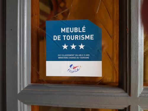 a sign on a door that reads middle de tumme at Les Souchottes, charmante maisonnette in Bulligny