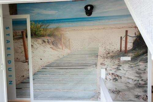 a boardwalk to the beach peel and stick wall mural at de Staelduinhoeve in 's-Gravenzande
