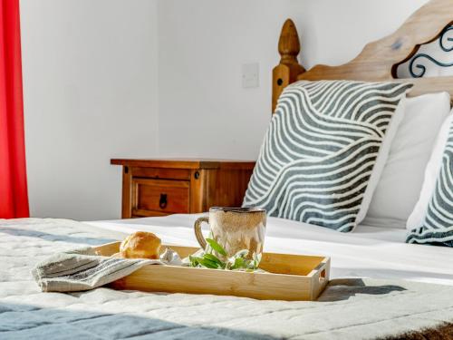 Ein Bett oder Betten in einem Zimmer der Unterkunft Sanders Azzurro