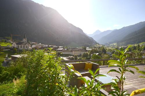 a view of a town with mountains in the background at DESIGN-CHALETS by Pferd auf Wolke NEU in Gaschurn