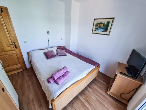 Ένα ή περισσότερα κρεβάτια σε δωμάτιο στο Apartment Hrastov
