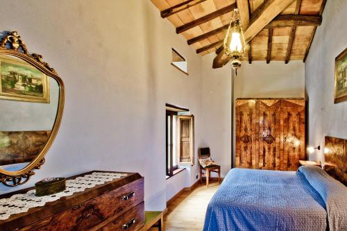 Katil atau katil-katil dalam bilik di Agriturismo Terra Di Michelangelo