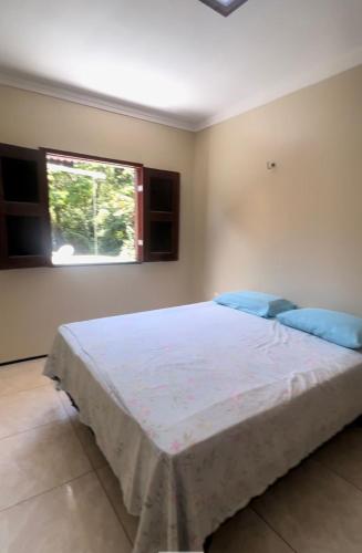 En eller flere senge i et værelse på Chalé Esmeralda - Serra de Guaramiranga