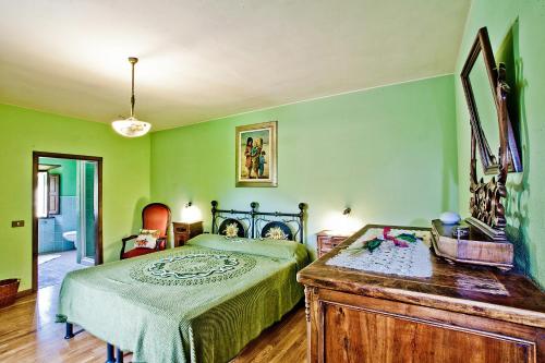 Katil atau katil-katil dalam bilik di Agriturismo Terra Di Michelangelo