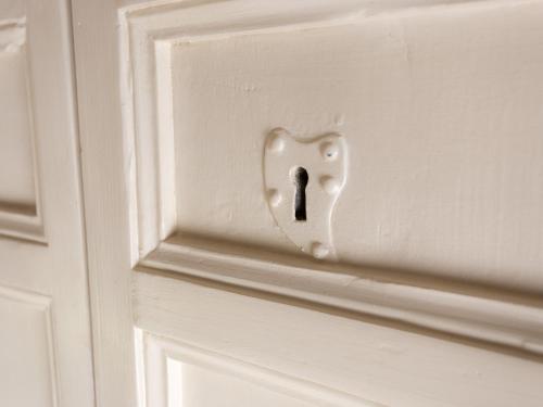 ajar door knob on a white door at Antica Dimora San Girolamo in Licata