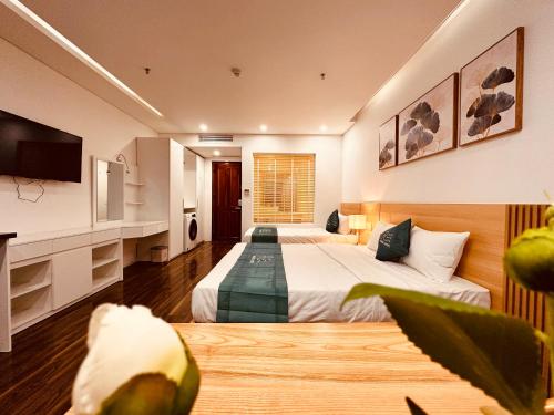 Postel nebo postele na pokoji v ubytování Rivera Suites