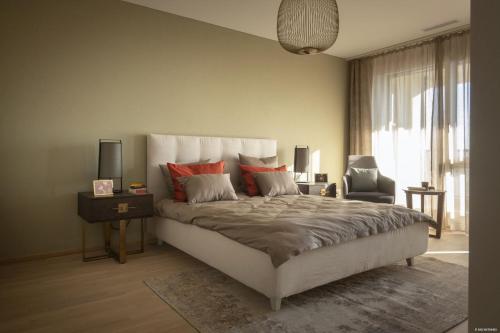 Giường trong phòng chung tại Senevita Dorfmatt Ferienwohnungen und Apartments