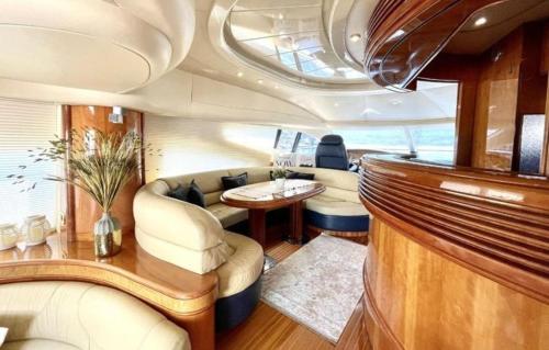 a luxury yacht with a living room and a table at luxerholiday in Antalya