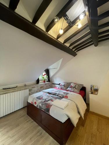 Postel nebo postele na pokoji v ubytování Chambre équipée Magnolia - 2 pers avec sdb wc privé