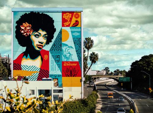 a mural of a woman on the side of a building at The Pierside Santa Monica in Los Angeles