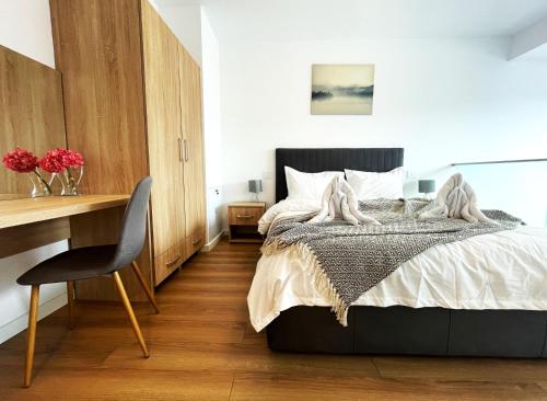 Postel nebo postele na pokoji v ubytování Sinaia Walter 20 Penthouse w. Private Parking