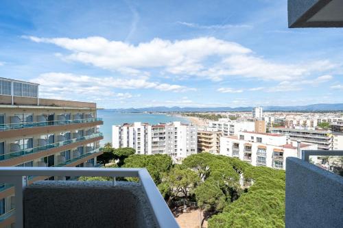 an apartment balcony with a view of a city at Rentalmar Blue Beach & Pool in Salou