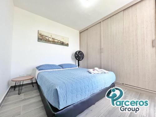 Cama o camas de una habitación en Apartamento Cerca a Expofuturo Por Parceros Group