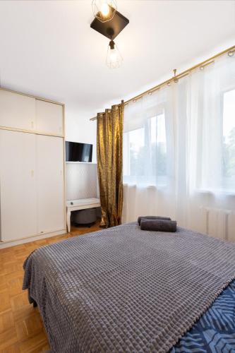 Säng eller sängar i ett rum på ClickTheFlat Bellottiego Apart Rooms