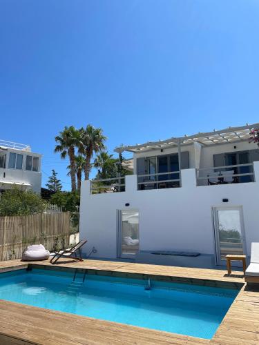 Minimal Blue Apartment with Sunset View in Paros