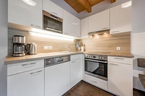 Kuchyň nebo kuchyňský kout v ubytování rechenau LIVING & RELAX