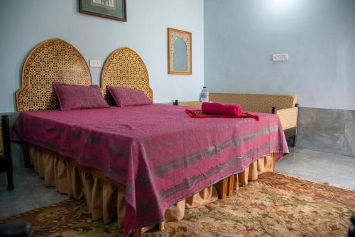 Ένα ή περισσότερα κρεβάτια σε δωμάτιο στο Little prince guest house & homestay