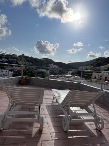 two chairs sitting on top of a roof at Casa Santa Maria - Suite Mediterraneo in Ponza