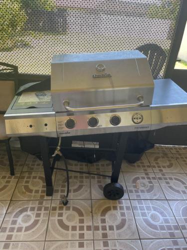 a grill sitting on top of a table at Cozy Guest House Florida, Tamarac in Tamarac