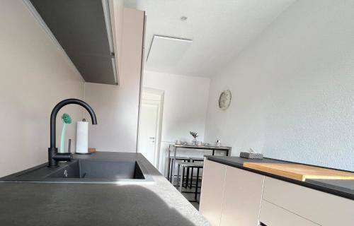 a kitchen with a sink and a counter at Wohnung in Graz in Graz