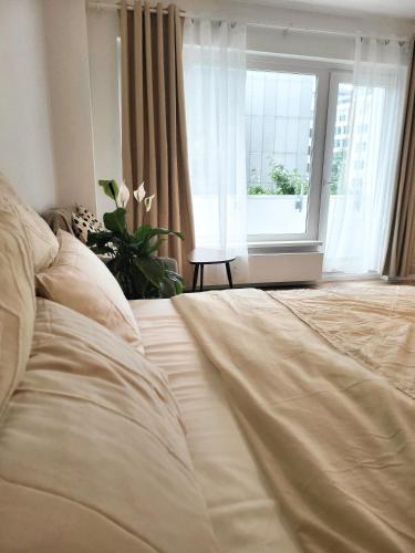 Postel nebo postele na pokoji v ubytování Studio Apartment