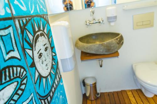 a bathroom with a sink and a toilet at ArkaBarka 2- Floating Dream Rooms and Apartments in Belgrade