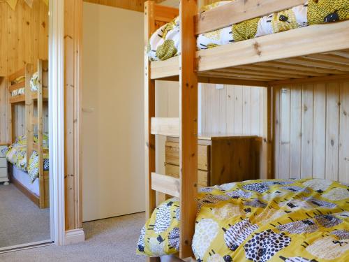 Poschodová posteľ alebo postele v izbe v ubytovaní Sparrows Nest