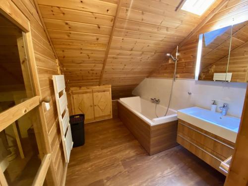 a bathroom with a toilet and a tub and a sink at Appartement Les Angles, 4 pièces, 6 personnes - FR-1-758-11 in Les Angles