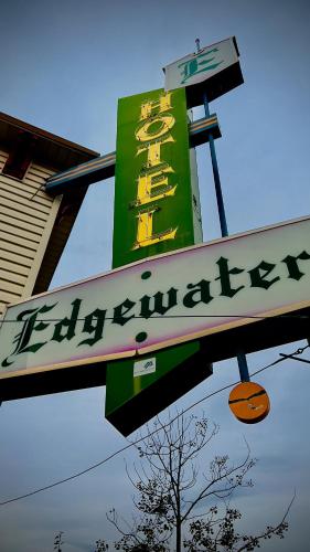 a sign for a chinese restaurant on a building at Edgewater Hotel in Whitehorse