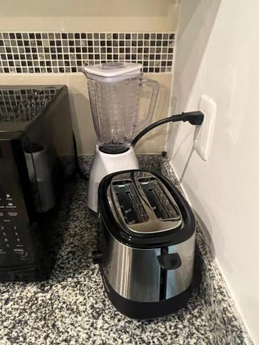 a blender sitting on top of a counter at Beautiful condo in Cancun! Dreams Lagoon in Cancún
