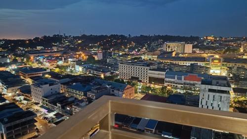 a view of a city skyline at night at SLEPTOPIA Premium Unit with Twin Queen Bed in Nagoya