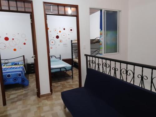 Postel nebo postele na pokoji v ubytování CÓMODO APARTAMENTO CENTRAL EN BARRIO SEMI RURAl