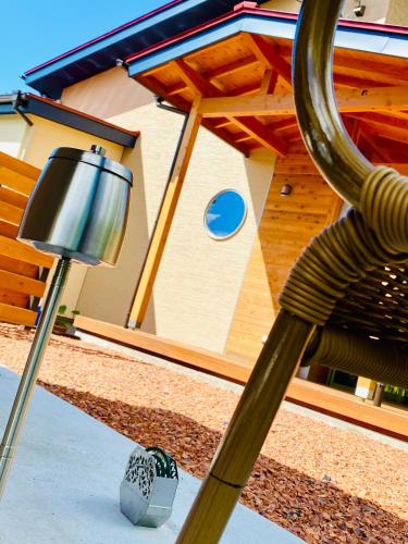 a street light sitting next to a building at Private Villa ietona in Fujikawaguchiko