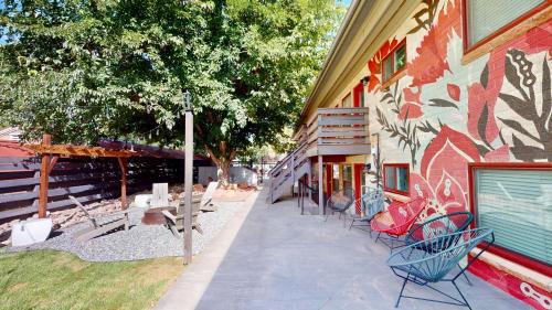 a group of chairs sitting outside of a building at Moab Flats #2 in Moab