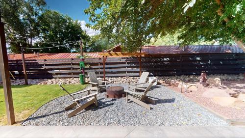 a group of benches sitting in a park at Moab Flats #2 in Moab