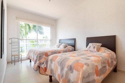 Säng eller sängar i ett rum på Acapulco Diamante. Casa de descanso